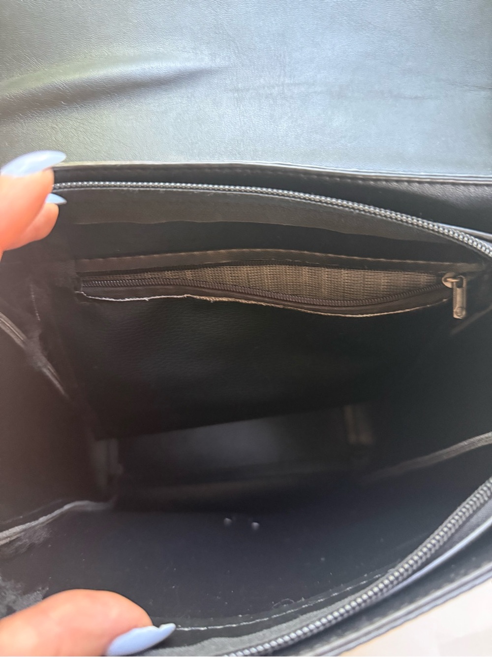 Minimalist Black Backpack with Circular Ring Detail - Picture 3 of 4